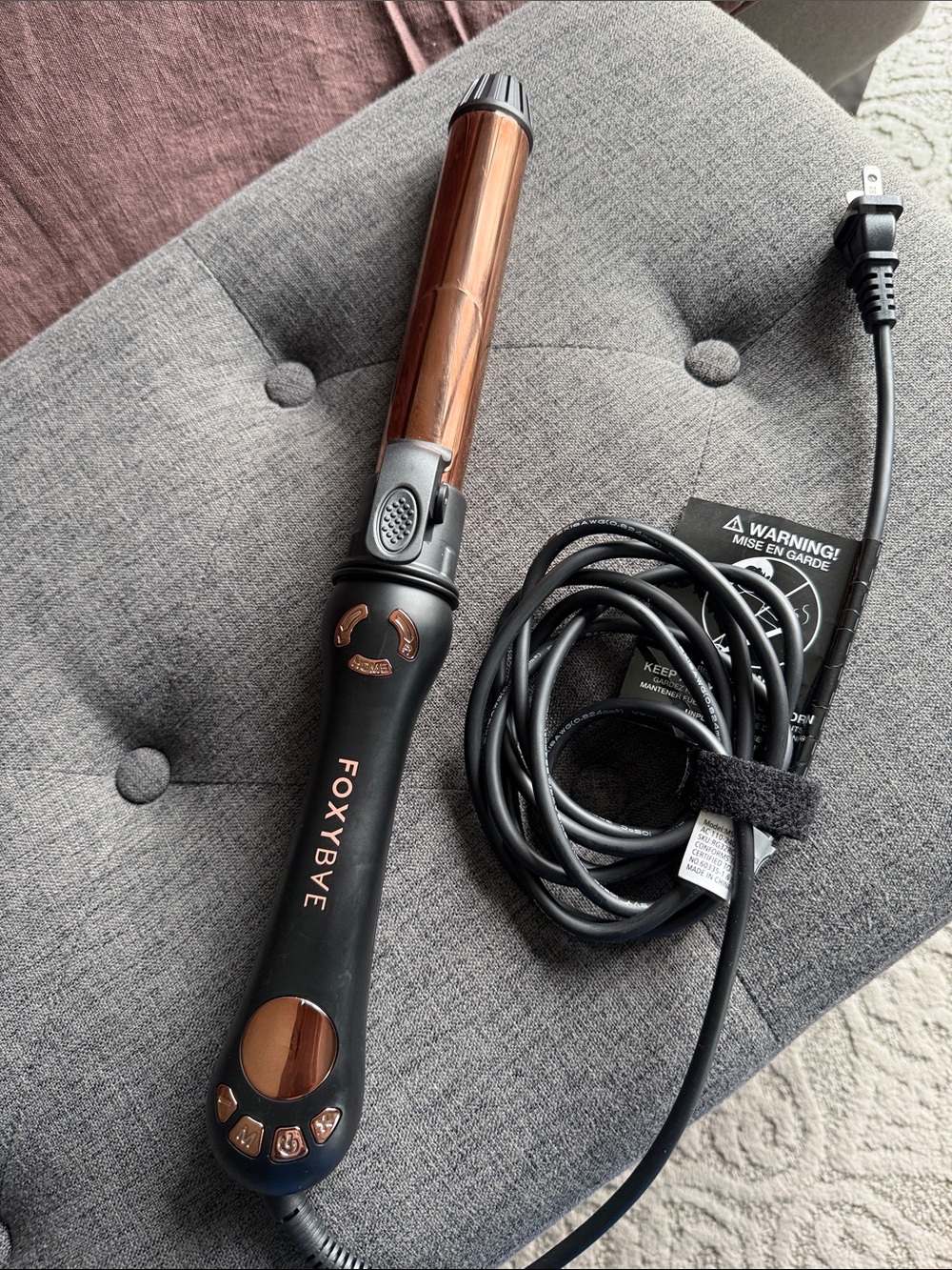 Rotating curling iron
